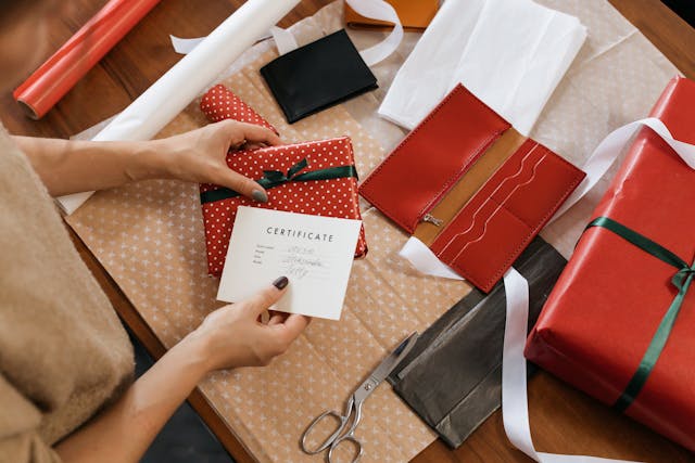 A Person Wrapping Presents