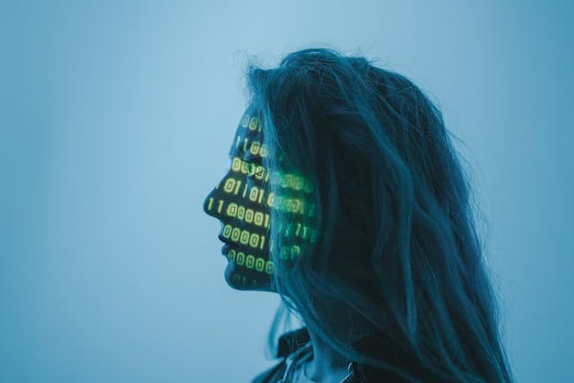 A Woman with Number Code on Her Face while Looking Afar (2).jpg