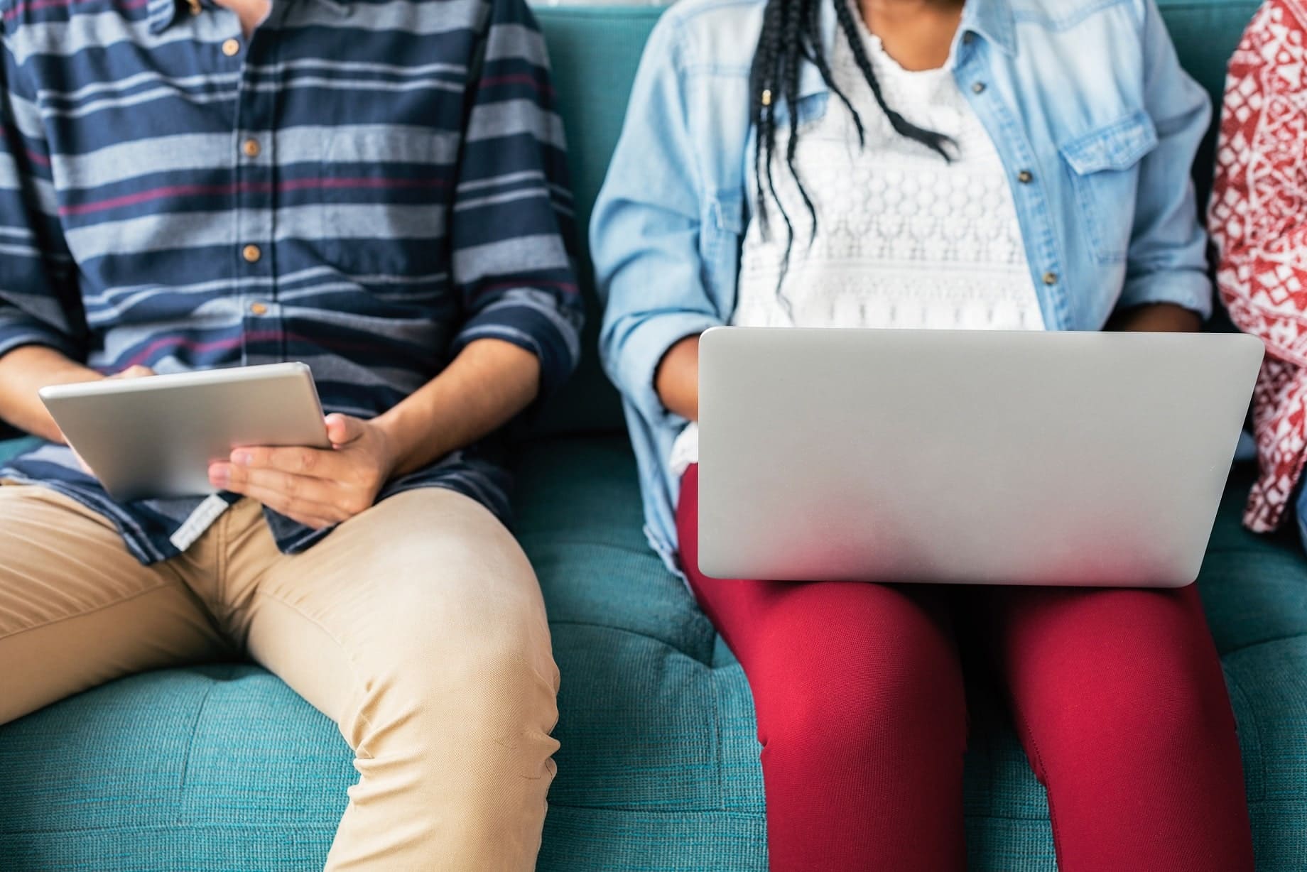 A couple on laptop and tablet