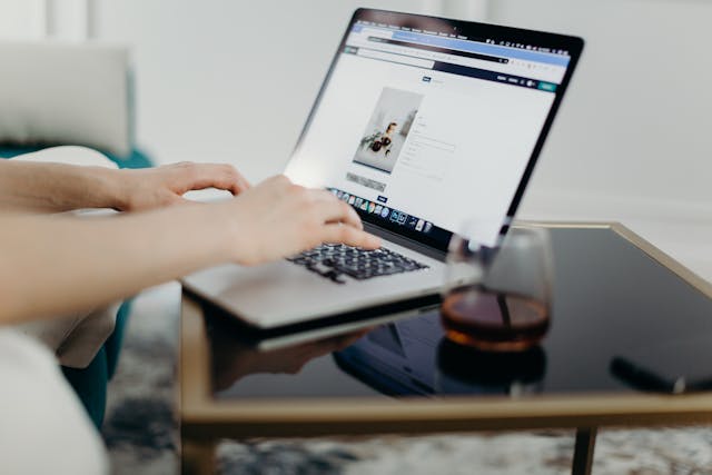Person Using Macbook Laptop to Share a Presentation
