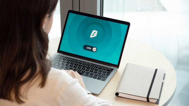 Woman Using Macbook Pro VPN