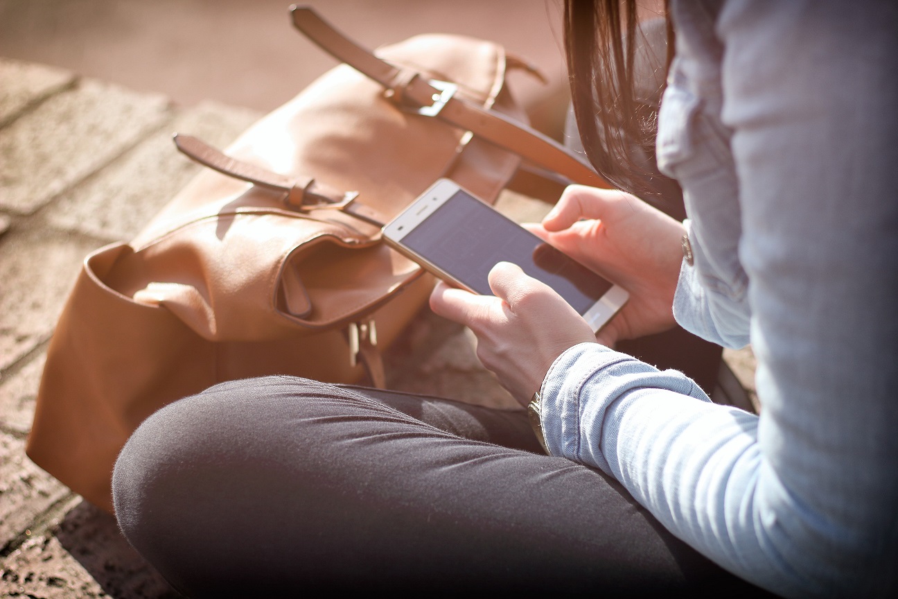 A girl with her mobile phone