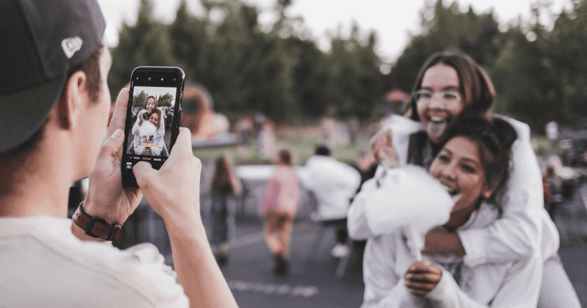 A group of friends taking pictures