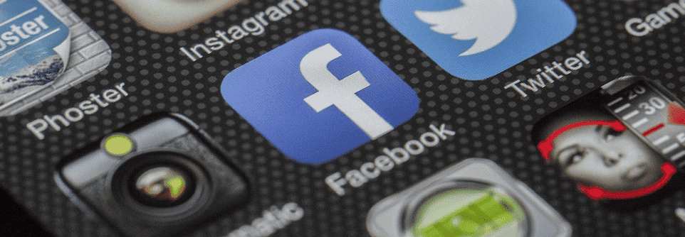Social media apps icons on mobile phone