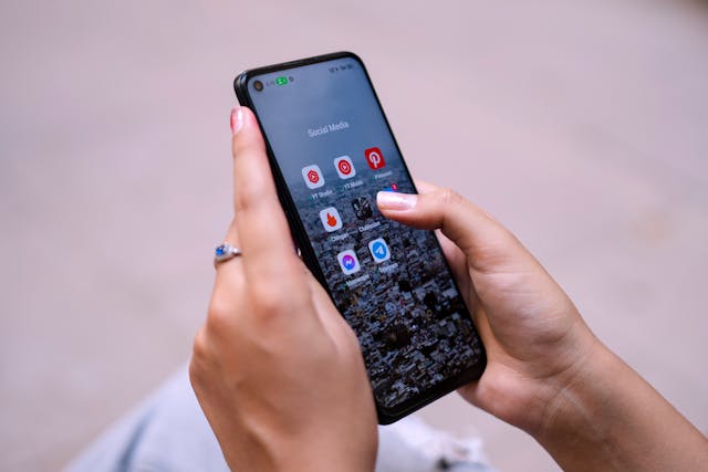Mobile device in someone's hand - Koofr cloud storage